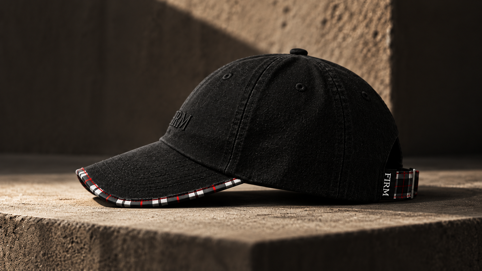 Black FIRM cap in diagonal light